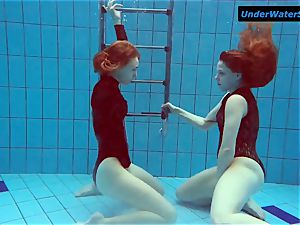 two super-steamy teens underwater